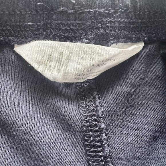 Kids' Shorts Bundle: H&M Patterned (Size 7/8) & Nike Black Athletic (Size M) - Picture 5 of 12